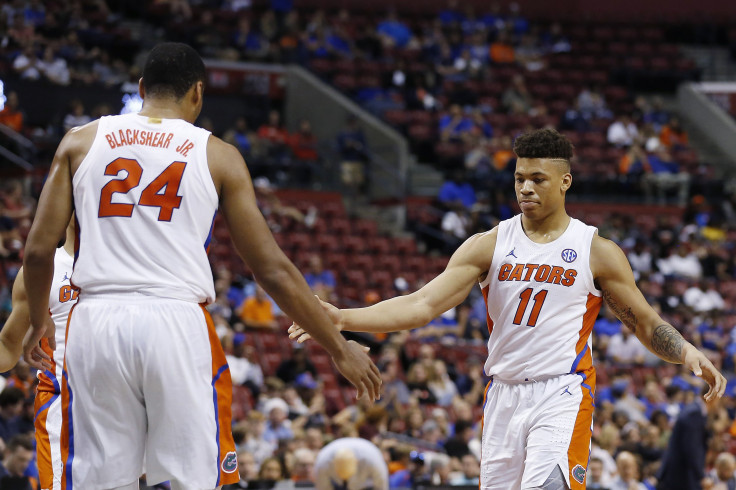 Kerry Blackshear Jr. #24 of the Florida Gators celebrates with Keyontae Johnson #11 