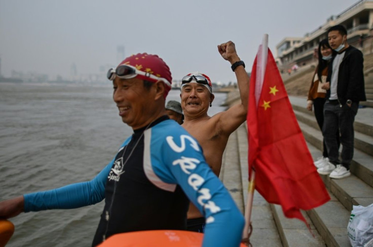 Many of the swimmers are middle-aged or older men; some credit their good health to their regular river swims
