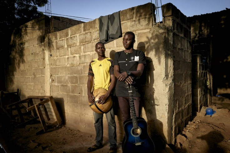 Amadou Guindo (left) and Ali Traore are members of the band "Espoir de Niafunke" (Hope of Niafunke)