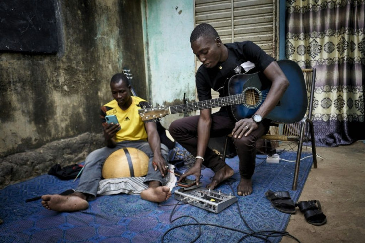 Ali Traore (right) works with Sahel Sounds, a record label specialising in Africa's semi-arid Sahel