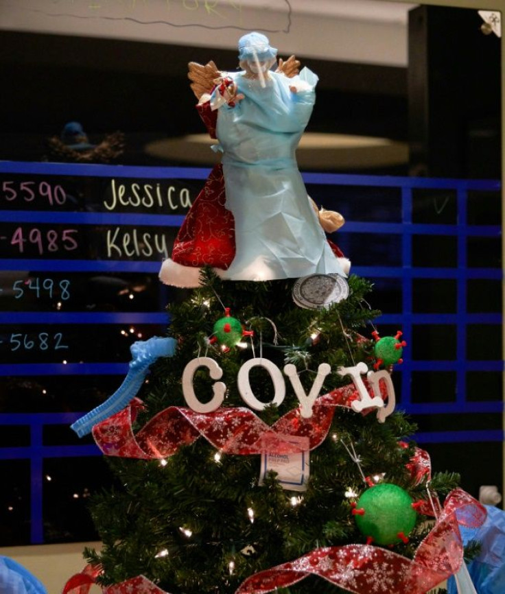 An angel wearing PPE on top of the Christmas tree at UMass Memorial Hospital on December 4, 2020 in Worcester, Massachusetts