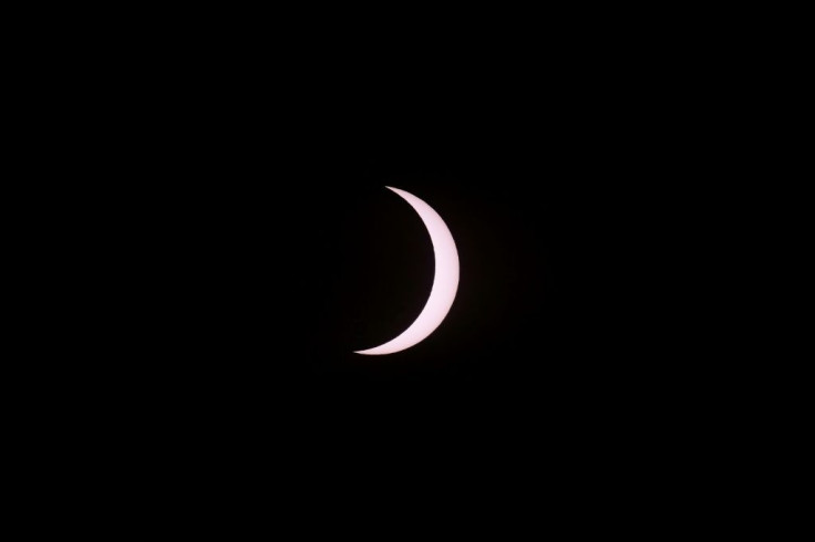A sliver of the sun is seen just before the total solar eclipse as seen from Piedra del Aquila, Argentina on December 14, 2020