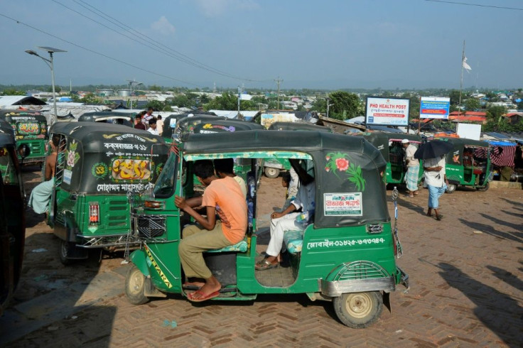 Refugees are taken to checkpoints at the camp's edges by rickshaw drivers, where security forces typically wave them through for a bribe