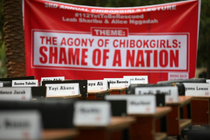 The abduction sparked memories of the kidnapping the Chibok schoolgirls. Pictured: a protest in April 2019, in which the names of missing girls were placed on desks