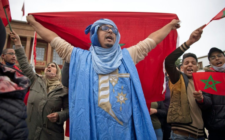 Moroccans celebrated in front of the parliament building in Rabat after the US adopted a new official map of Morocco that includes the disputed territory of Western Sahara