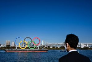Ringing the changes: the Olympic logo was removed from the waterfront in Tokyo before being reinstalled at the start of December