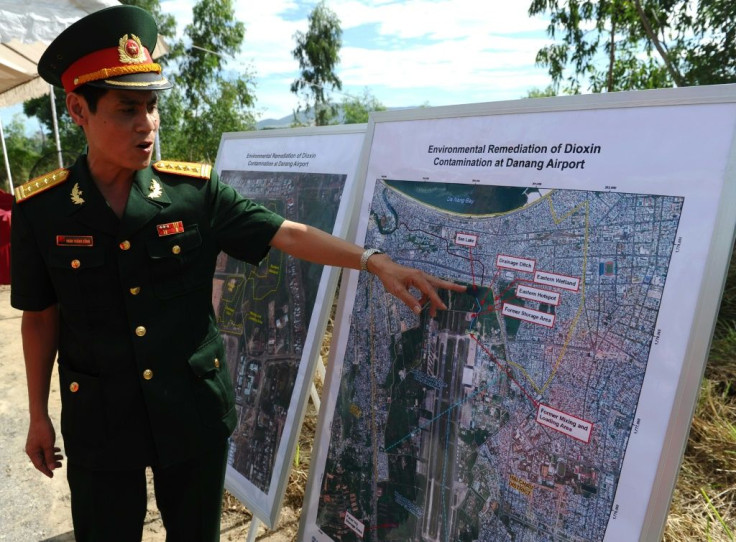 A Vietnamese army colonel pointing out dioxin-contaminated areas in 2012