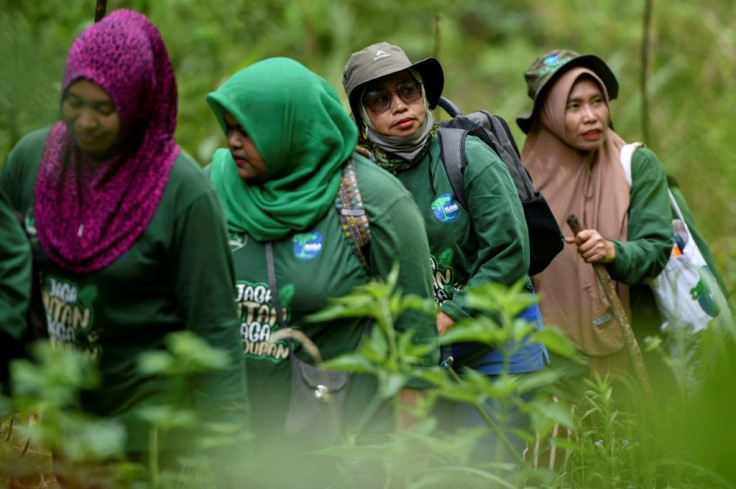 A unique team of female forest rangers patrols the jungle in Sumatra, battling poachers and illegal loggers