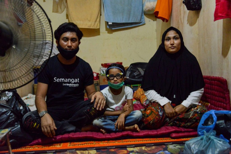 After recognising his wife and daughter, Shah quit his job in Malaysia and made his way to the camp in Indonesia where they were living