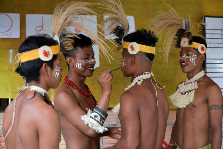 Gay indigenous men prepare before performing in Nazareth