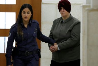 Malka Leifer, a former Australian teacher accused of dozens of cases of sexual abuse of girls at a school, arrives for a hearing at the District Court in Jerusalem in February 2018