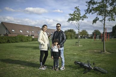 Home at last: Alia, Ahmad and their son Adam fled Iraq to seek out a new, safer life in the Netherlands