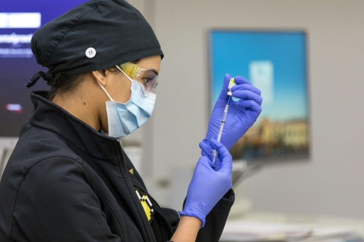 Nurse Komal Kaur prepares a dose of the Pfizer-BioNTech Covid-19 vaccine at the Valley Childrenâs Hospital in Madera, California