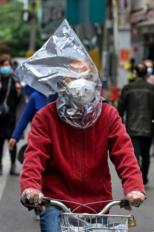 People in Wuhan would come up and ask what I was doing there, says AFP photographer Hector Retamal, who has been named news agency photographer of the year by The Guardian