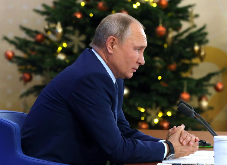 Russian President Vladimir Putin addresses his annual press conference via a video link at the Novo-Ogaryovo state residence outside Moscow.