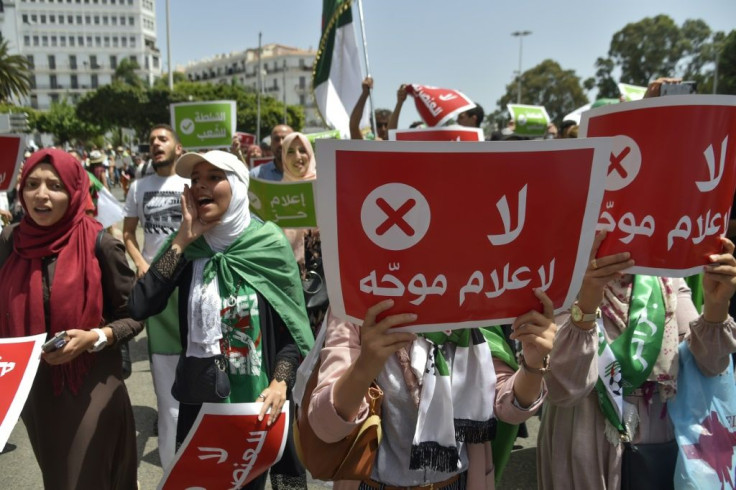 During a Hirak demonstration last year, protesters carried placards saying in Arabic 'No to biased media'