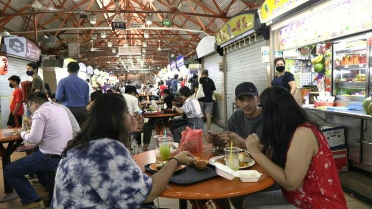 UNESCO on Wednesday approved Singapore's bid to have its street food included on a list of intangible cultural heritage.The city-state is full of open-air food courts where vendors serve delectable -- and cheap -- dishes.