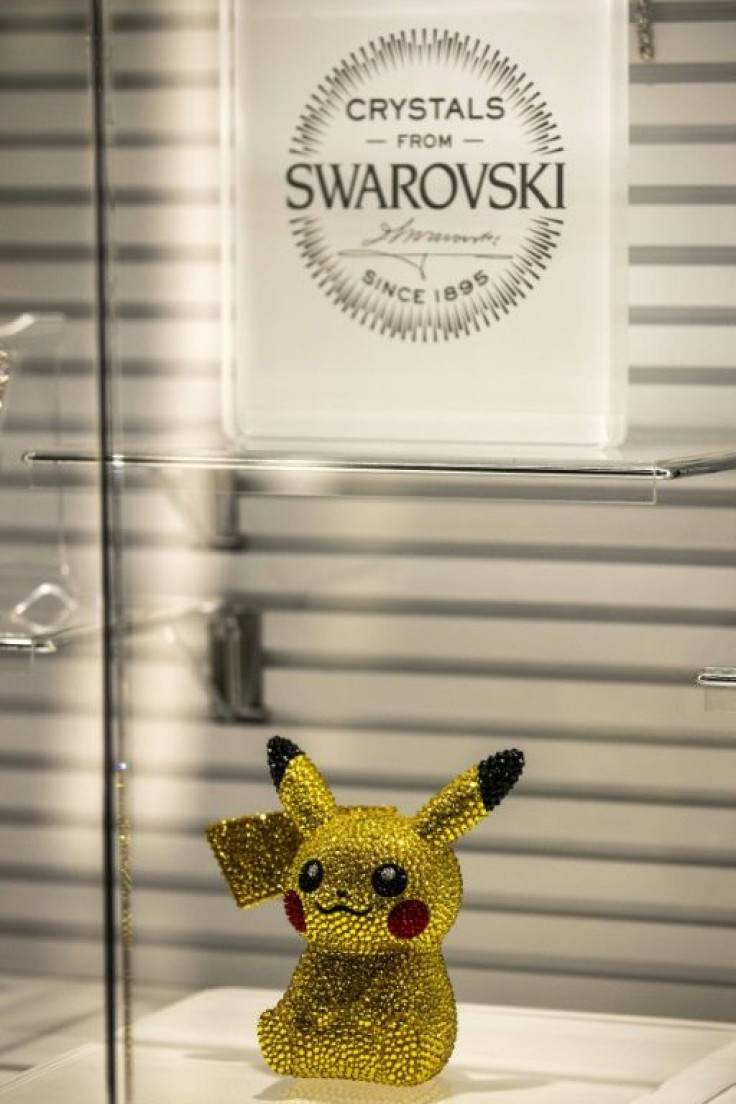 A statuette of Pokemon game character Pikachu, studded with Swarovski crystals, is displayed at a Pokemon store in Tokyo