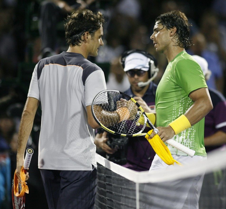 Federer of Switzerland congratulates Nadal of Spain after Nadal won semi-final match at Sony Ericsson Tennis Tournament in Key Biscayne
