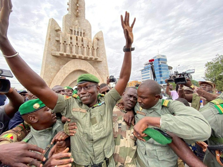 Colonel Malick Diaw, the junta's No. 2, pictured amid cheering supporters three days after the coup. He was later named president of a transitional parliament.