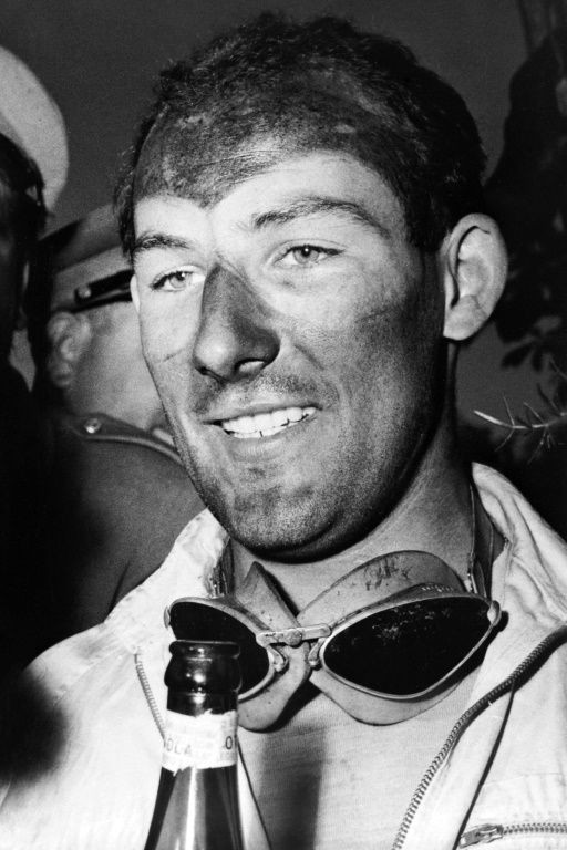Stirling Moss after winning the iconic Mille Miglia endurance race in 1955.