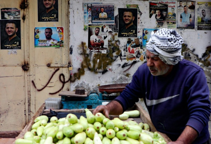 Walls in Balata are plastered with posters of Palestinians who died fighting the Israeli occupation but now intra-Palestinian violence has claimed "martyr" of its own