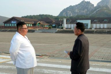 North Korean leader Kim Jong Un (C) inspected the Mount Kumgang tourist area in 2019 and described it as an eyesore
