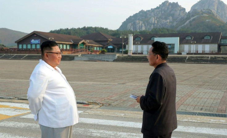 North Korean leader Kim Jong Un (C) inspected the Mount Kumgang tourist area in 2019 and described it as an eyesore