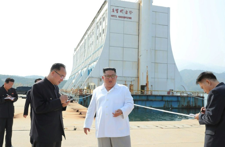 North Korean leader Kim Jong Un (C) in 2019 described facilities at the Mount Kumgang tourist area as 'shabby' and ordered their removal