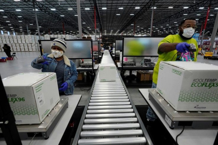 Boxes containing the Moderna Covid-19 vaccine are prepared to be shipped at the McKesson distribution center in Olive Branch, Mississippi, on December 20, 2020
