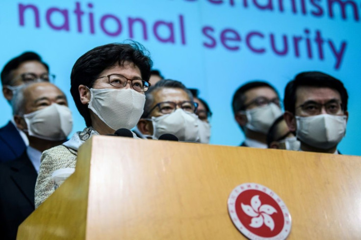 Hong Kong Chief Executive Carrie Lam (front L) insists the security law imposed by Beijing was necessary to restore order after huge and often violent democracy protests