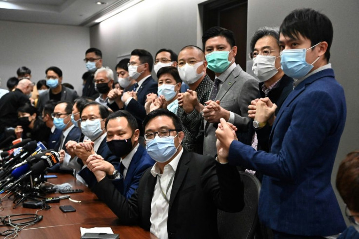 Hong Kong's pro-democracy lawmakers resigned en masse when authorities disqualified four of their colleagues because of their political views