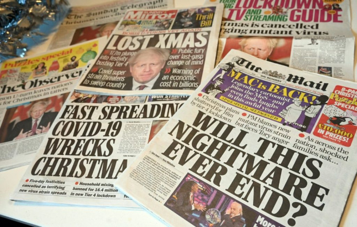 British newspaper headlines lamented tighter restrictions over the Christmas holidays