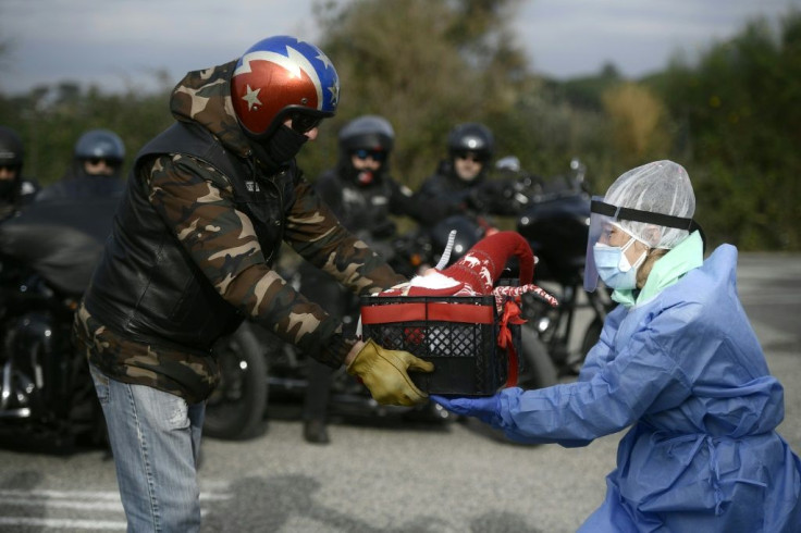 As Italy entered new restrictions, Harley Davidson fans brought Christmas gifts to medical workers in Rome