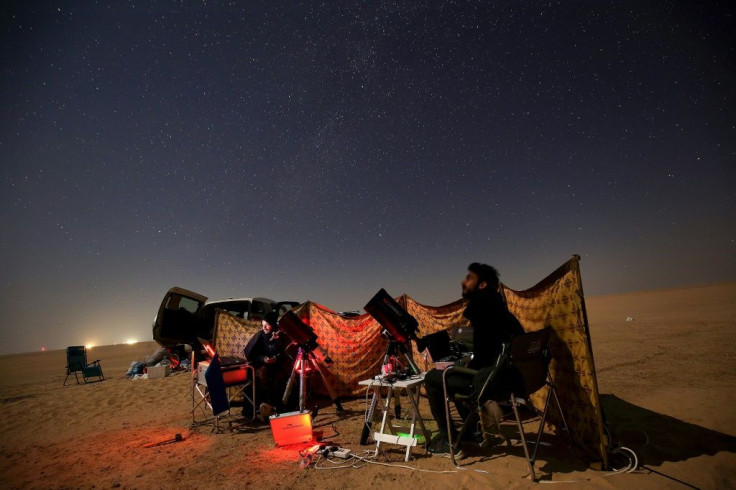 Kuwaiti astrophotographers follow the great conjunction between Jupiter and Saturn in al-Salmi district, west of Kuwait City, on December 21, 2020