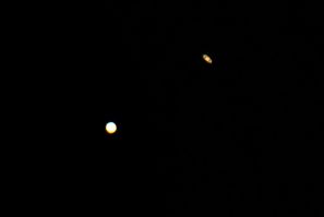 A picture taken on December 21, 2020, in al-Salmi district, west of Kuwait City, shows the great conjunction of Jupiter and Saturn