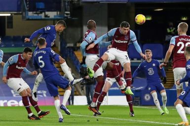 Chelsea defender Thiago Silva (third left) heads his side in front against West Ham at Stamford Bridge