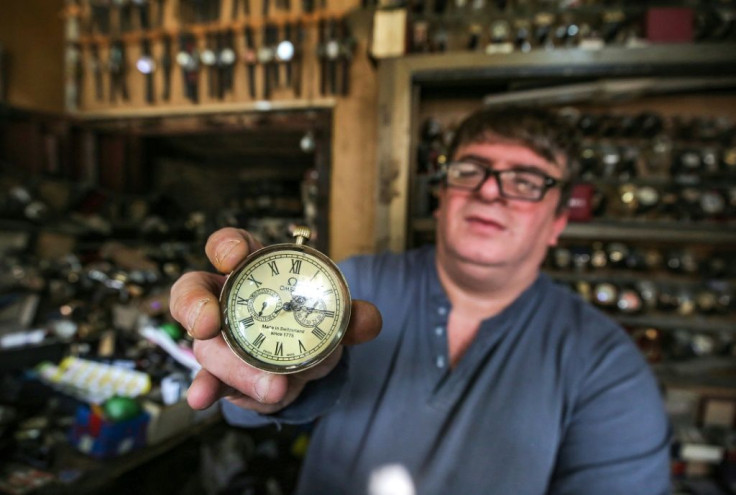 Youssef Abdelkarim, who believes that a "man's elegance begins with his watch", holds an antique pocket-watch