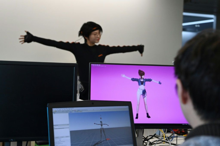 To get the virtual pop stars onto a real-life stage, producers use a mixture of computer animation and real-time motion-capture technology with an actor