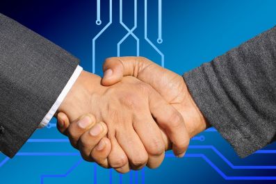 Businessmen shaking hands -- handshake