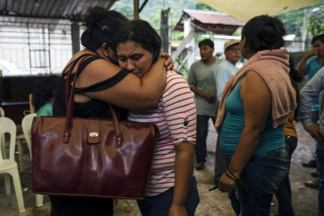 Friends and relatives of murdered Mexican journalist Julio Valdivia attend his funeral in Tezonapa, state of Veracruz, Mexico, on September 10, 2020