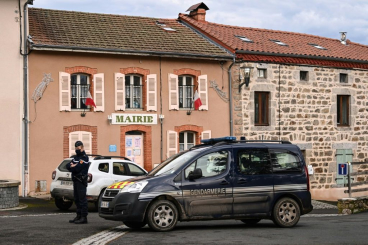 The city hall in Saint-Just, central France, on Wednesday as security forces locked down the area after a man shot and killed three officers.