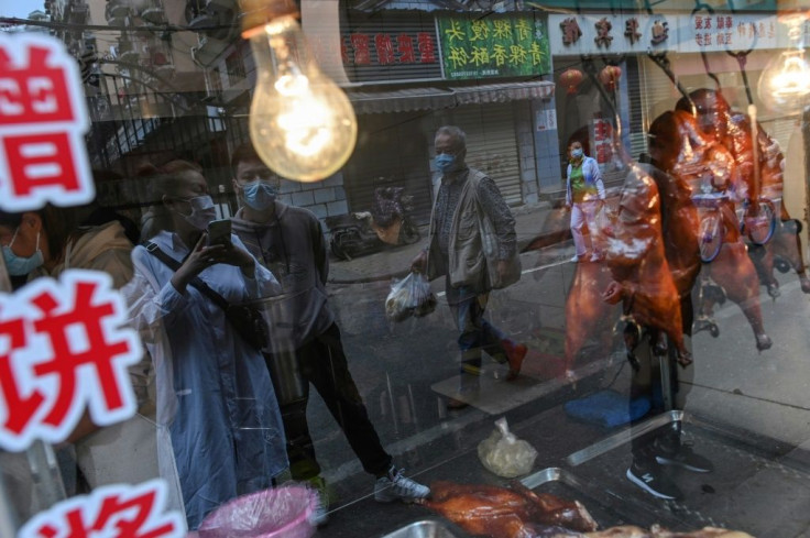 China's rapid economic growth has profoundly changed eating habits, with figures Wednesday revealing more than half of adults are now overweight
