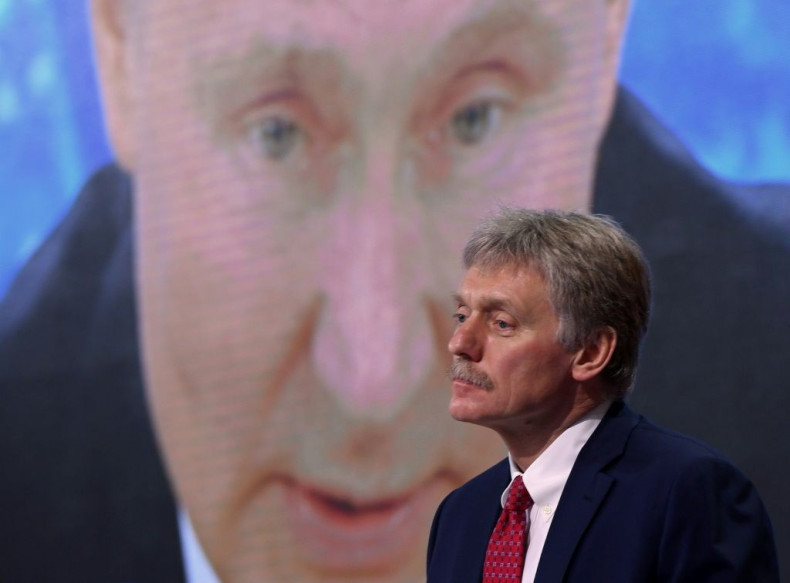 Putin's spokesman Dmitry Peskov (R) said the Kremlin was expecting "nothing positive" in ties with Washington