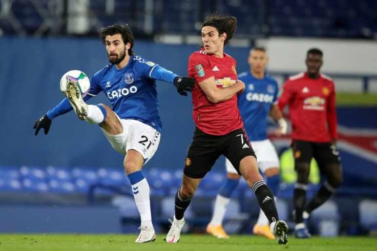 Manchester United striker Edinson Cavani (C) scored against Everton