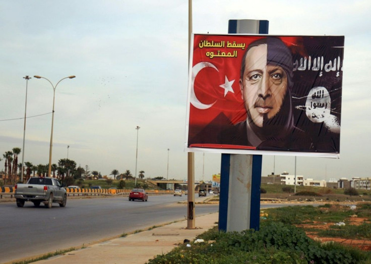 A billboard defaming Turkish President Recep Tayyip Erdogan as an Islamic State group member in the eastern Libyan port city of Benghazi