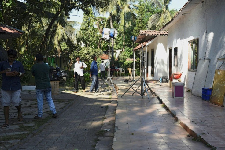 A lighting crew works on a Bollywood film set on Madh Island off the coast of Mumbai. The Indian film industry is hoping to bounce back in 2021