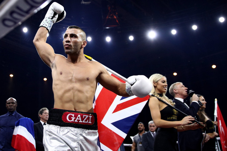 Avni Yildirim (L) of Turkey reacts before the Super Middleweight World Boxing Super Series fight at Hanns-Martin-Schleyer Halle 