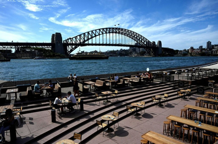Restaurants along Sydney Harbour are usually packed with locals and tourists on Christmas Eve but are now quiet due to Covid-19 concerns
