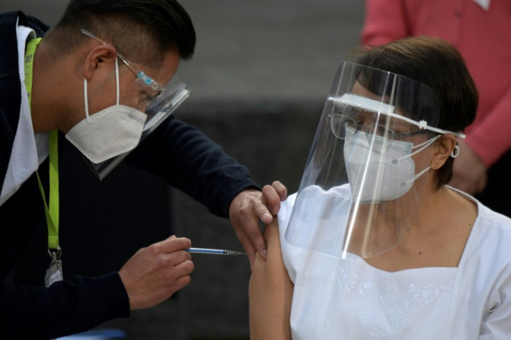 Nurse Maria Irene Ramirez was the first person in Mexico shown receiving the coronavirus vaccine under a mass immunization program